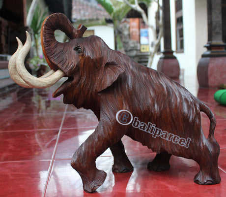 Wooden walking Elephant, hand carved from Suar wood H 14.4"